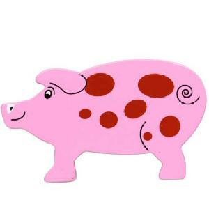 A painted wooden pig figure A painted wooden pig figure